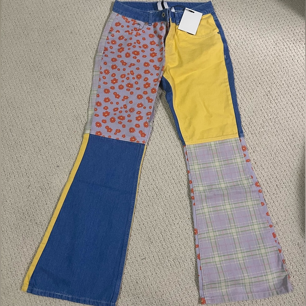 BRAND NEW WITH TAGS RAGGED PATTERNED JEANS